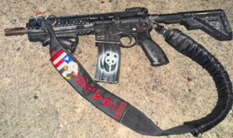 Imagem de Suspeito morto em megaoperação no Rio de Janeiro tinha bandeira da Bahia em fuzil
