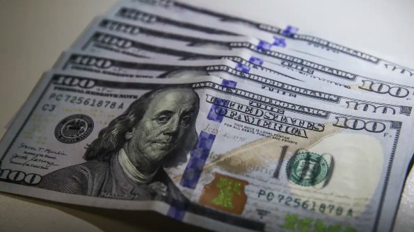 Imagem de Dólar fecha em queda pelo sétimo pregão seguido, cotado a R$ 5,86